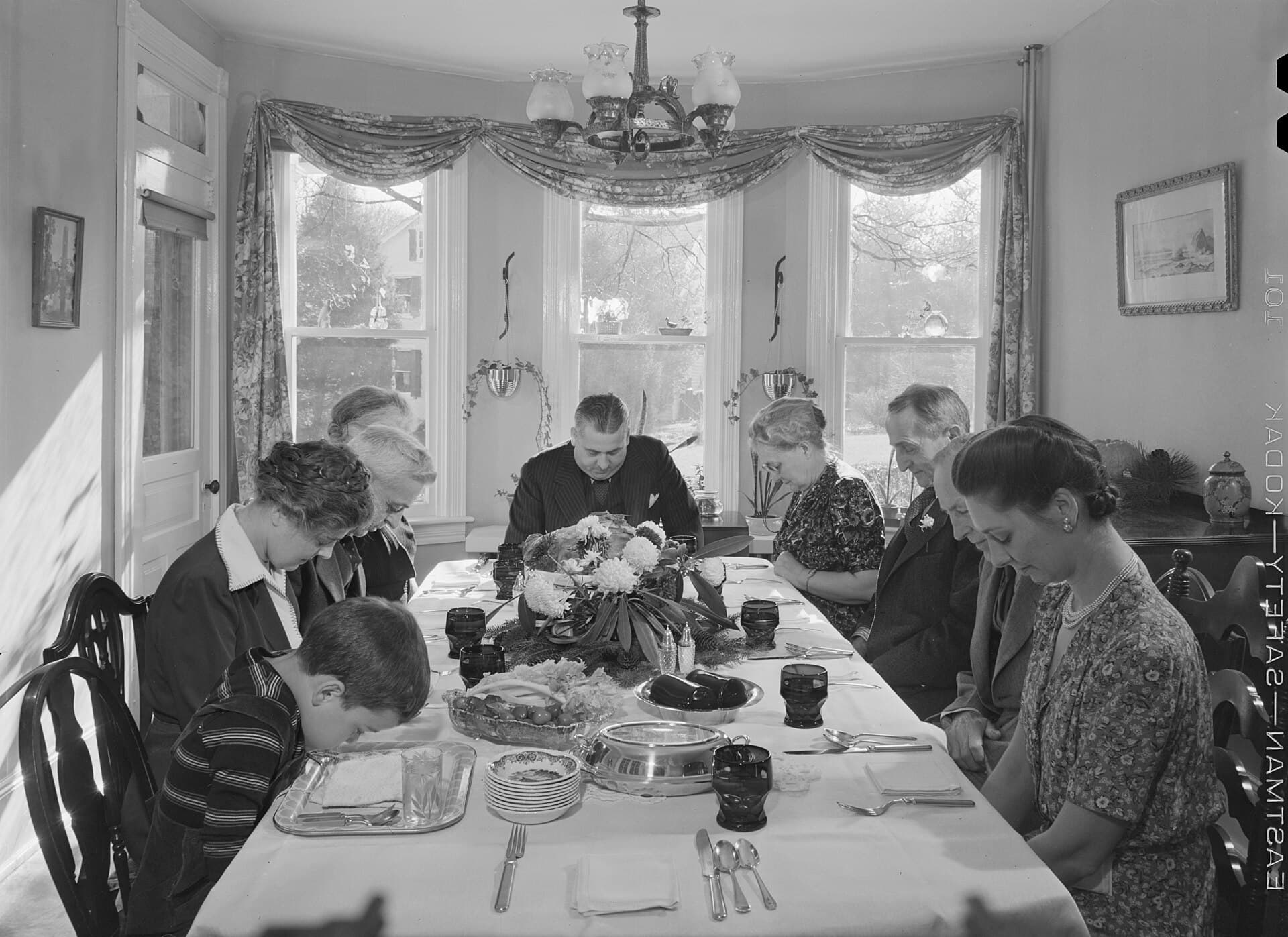 Family saying grace before a Thanksgiving dinner in Pennsylvania in 1942