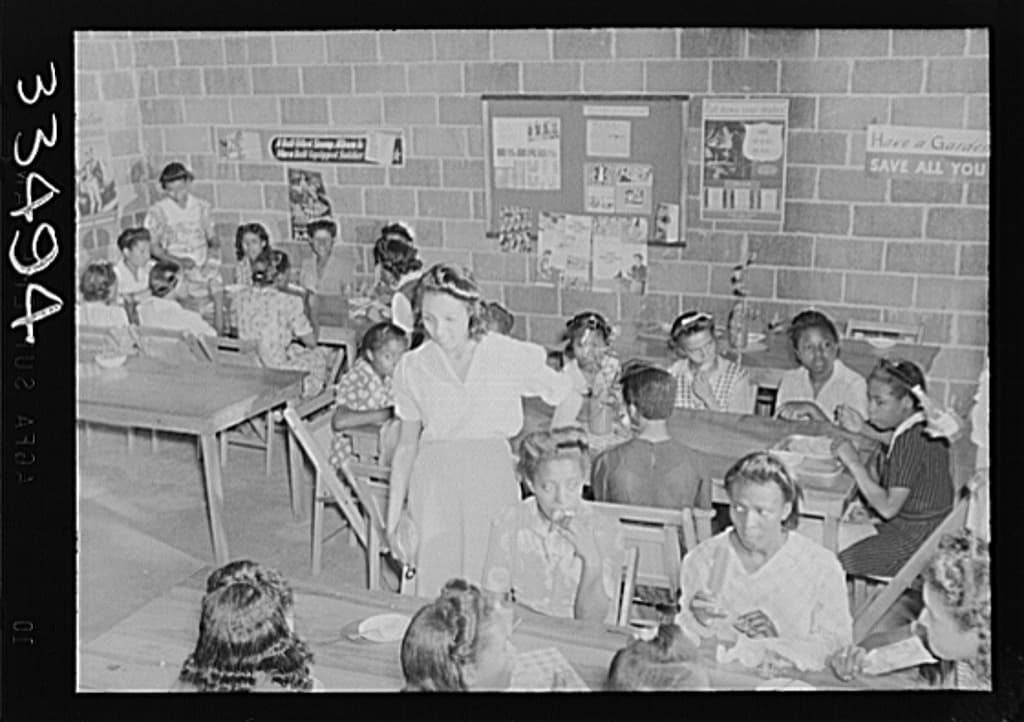 Students eating in a Charlotte Court House, Virginia school lunchroom in 1943