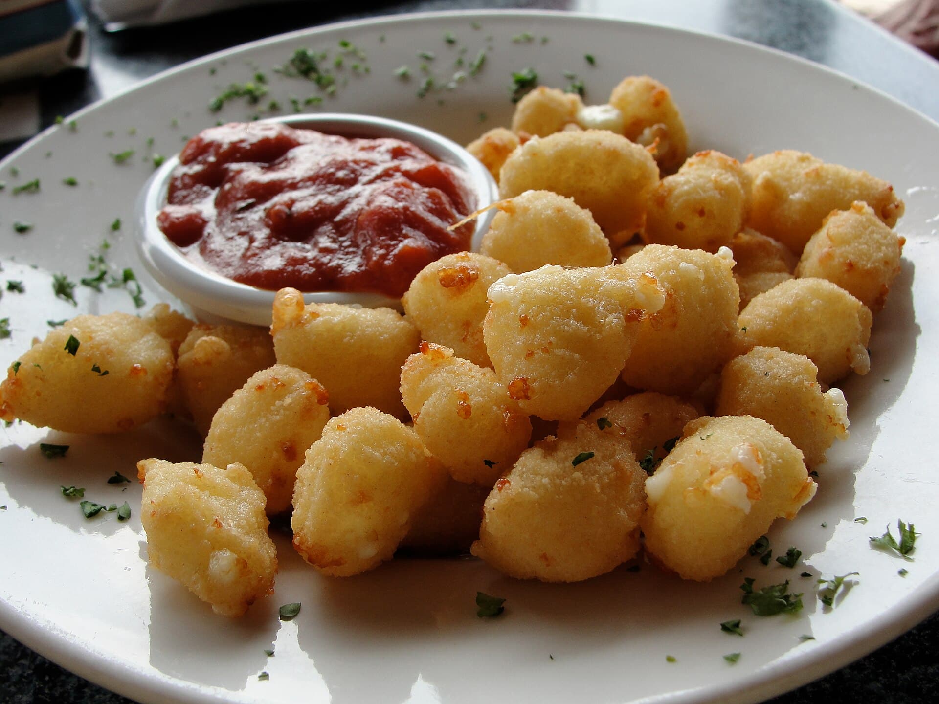Fried Cheese Curds prepared as a finished dish