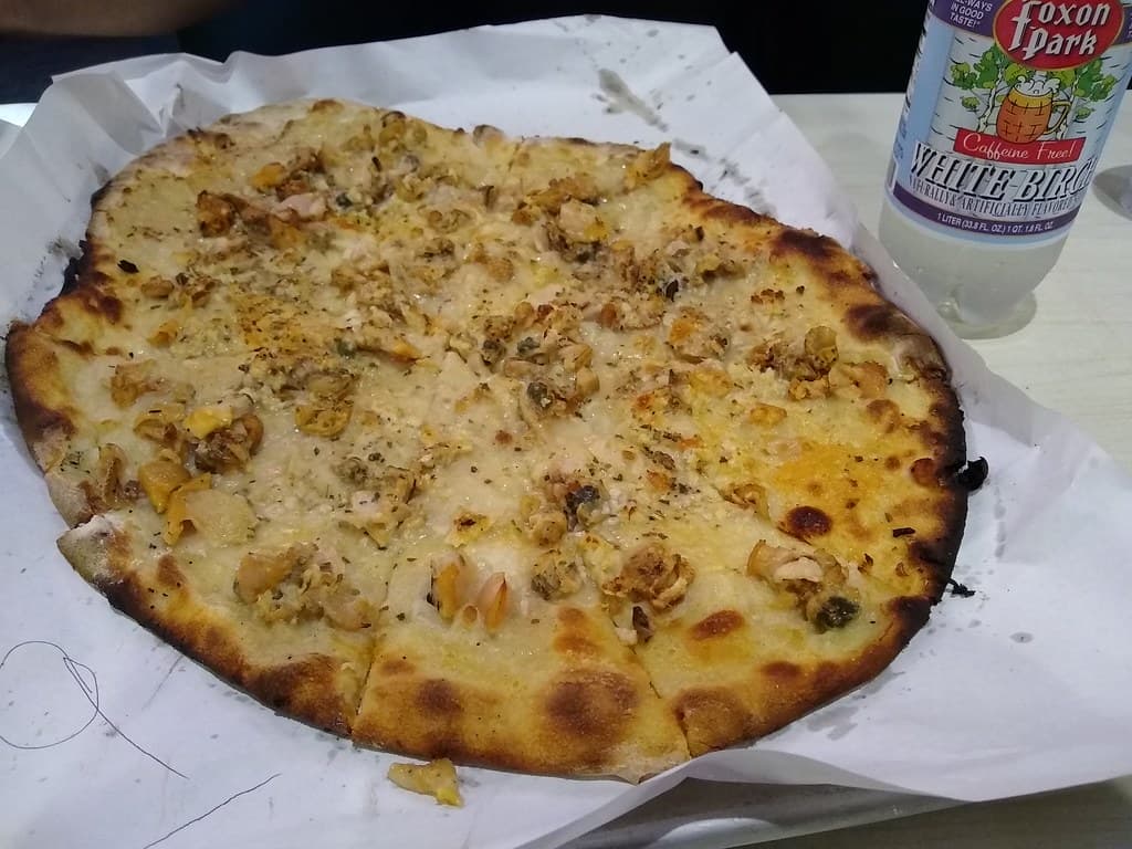 New Haven Clam Pizza prepared as a finished dish